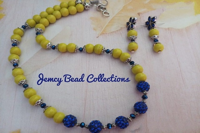 Yellow with Blue Glittering Balls