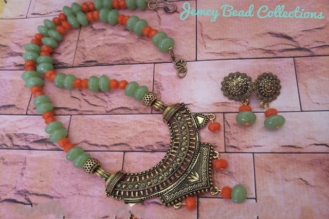Light Green Rondelle and Orange Crystals with Antique Pendant